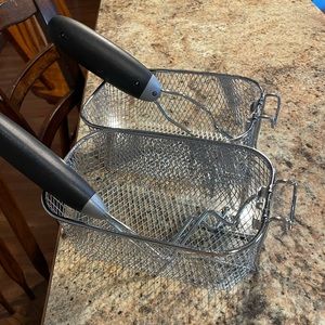 2 small deep fry baskets with detachable handles for storage. Never used!
